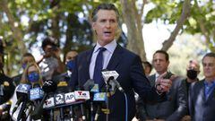 California Governor Gavin Newsom speaks during a news conference regarding the San Jose rail yard shooting in San Jose, California on May 26, 2021. - The suspect in a mass shooting that killed eight people at a California rail yard May 26, 2021 took his o