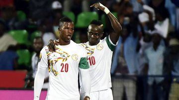 Senegal&#039;s forward Sadio Mane (R) celebrates with Senegal&#039;s forward Keita after scoring a goal during the 2017 Africa Cup of Nations group B football match between Senegal and Zimbabwe in Franceville on January 19, 2017. / AFP PHOTO / KHALED DESOUKI