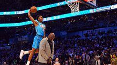 Feb 16, 2019; Charlotte, NC, USA; Oklahoma City Thunder forward Hamidou Diallo dunks over Shaquille O&#039;Neal in the Slam Dunk Contest during the NBA All-Star Saturday Night at Spectrum Center. Mandatory Credit:  Bob Donnan-USA TODAY Sports