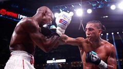 LAS VEGAS, NEVADA - SEPTEMBER 30: Yordenis Ugas (white trunks) trades punches with�Mario Barrios (black trunks)�during their�middleweight fight at T-Mobile Arena on September 30, 2023 in Las Vegas, Nevada.   Sarah Stier/Getty Images/AFP (Photo by Sarah Stier / GETTY IMAGES NORTH AMERICA / Getty Images via AFP)
