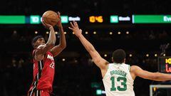 BOSTON, MASSACHUSETTS - MAY 17: Jimmy Butler #22 of the Miami Heat shoots over Malcolm Brogdon #13 of the Boston Celtics during the fourth quarter of game one of the Eastern Conference Finals at TD Garden on May 17, 2023 in Boston, Massachusetts. NOTE TO USER: User expressly acknowledges and agrees that, by downloading and or using this photograph, User is consenting to the terms and conditions of the Getty Images License Agreement.   Adam Glanzman/Getty Images/AFP (Photo by Adam Glanzman / GETTY IMAGES NORTH AMERICA / Getty Images via AFP)