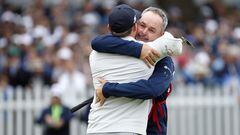 BROOKLINE, MASSACHUSETTS - JUNE 19: Matt Fitzpatrick of England celebrates with caddie Billy Foster after winning on the 18th green during the final round of the 122nd U.S. Open Championship at The Country Club on June 19, 2022 in Brookline, Massachusetts.   Jared C. Tilton/Getty Images/AFP
== FOR NEWSPAPERS, INTERNET, TELCOS & TELEVISION USE ONLY ==