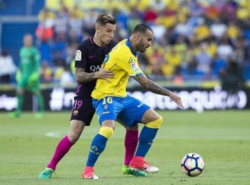 Barcelona's French defender Lucas Digne vies with Las Palmas' forward Jese.