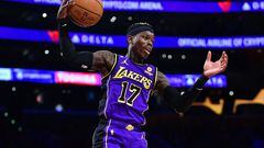 January 20, 2023; Los Angeles, California, USA; Los Angeles Lakers guard Dennis Schroder (17) gets a rebound against the Memphis Grizzlies during the second half at Crypto.com Arena. Mandatory Credit: Gary A. Vasquez-USA TODAY Sports