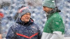 FOXBOROUGH, MASSACHUSETTS - JANUARY 07: New England Patriots head coach Bill Belichick and Aaron Rodgers #8 of the New York Jets speak before a game at Gillette Stadium on January 07, 2024 in Foxborough, Massachusetts.   Winslow Townson/Getty Images/AFP (Photo by Winslow Townson / GETTY IMAGES NORTH AMERICA / Getty Images via AFP)