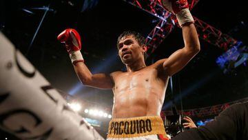 Manny Pacquiao celebrates after defeating Timothy Bradley Jr. by unanimous decision in their welterweight championship fight on April 9, 2016 at MGM Grand Garden Arena in Las Vegas, Nevada.