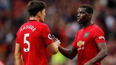 Soccer Football - Premier League - Manchester United v Chelsea - Old Trafford, Manchester, Britain - August 11, 2019  Manchester United&#039;s Harry Maguire and Paul Pogba celebrate at the end of the match  REUTERS/Phil Noble  EDITORIAL USE ONLY. No use w