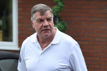 Former England national football team manager Sam Allardyce walks out of his home in Bolton on September 28, 2016.