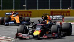 MONTREAL, QUEBEC - JUNE 09: Max Verstappen of the Netherlands driving the (33) Aston Martin Red Bull Racing RB15 leads Lando Norris of Great Britain driving the (4) McLaren F1 Team MCL34 Renault on track during the F1 Grand Prix of Canada at Circuit Gille