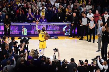 LeBron James #6 of the Los Angeles Lakers waves to fans after breaking Kareem Abdul-Jabbar's all-time scoring record of 38,388 points.