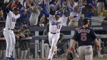 Los Angeles Dodgers first baseman Max Muncy (13) celebrates after his walk-off home run against the Boston Red Sox during the 18th inning in Game 3 of the World Series baseball game on Saturday