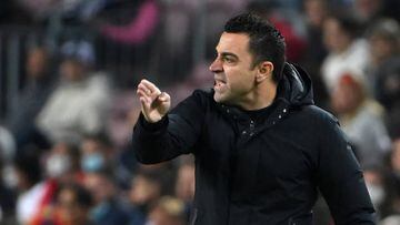 Barcelona's Spanish coach Xavi gestures during the Spanish League football match between FC Barcelona and Cadiz CF at the Camp Nou stadium in Barcelona on April 18, 2022. (Photo by LLUIS GENE / AFP) (Photo by LLUIS GENE/AFP via Getty Images)