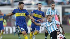 Racing Club's defender Gonzalo Piovi (R) is challenged by Boca Juniors' Paraguayan midfielder Oscar Romero during their Argentine Professional Football League semifinal match at Ciudad de Lanus stadium in Lanus, Buenos Aires, on May 14, 2022. (Photo by Alejandro PAGNI / AFP) (Photo by ALEJANDRO PAGNI/AFP via Getty Images)