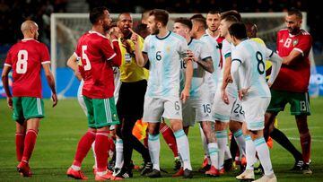 Soccer Football - International Friendly - Morocco v Argentina - Stade Ibn Batouta, Tangier, Morocco - March 26, 2019  Argentina&#039;s German Pezzella clashes with Morocco&#039;s Medhi Benatia  