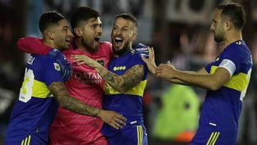 Boca Juniors' midfielder Alan Varela (L) celebrates with goalkeeper Agustin Rossi (2-L), forward Dario Benedetto (3-L) and defender Carlos Izquierdoz after scoring the winning penalty during the shoot-out against Racing Club during their Argentine Professional Football League semifinal match at Ciudad de Lanus stadium in Lanus, Buenos Aires, on May 14, 2022. (Photo by Alejandro PAGNI / AFP) (Photo by ALEJANDRO PAGNI/AFP via Getty Images)