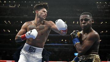 LOS ANGELES, CA - JULY 16: Ryan Garcia (white trunks) lands a punt on Javier Fortuna in the fourth round at the Crypto.com Arena on July 16, 2022 in Los Angeles, United States.   John McCoy/Getty Images/AFP
== FOR NEWSPAPERS, INTERNET, TELCOS & TELEVISION USE ONLY ==