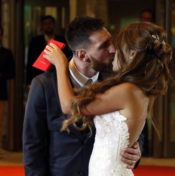 Messi and Antonella embrace