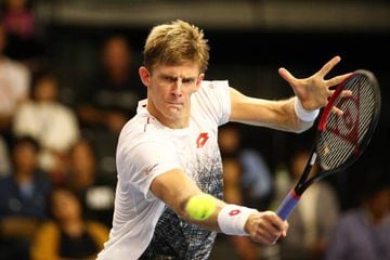 Kevin Anderson in action against Frances Tiafoe in Tokyo.