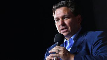 (FILES) In this file photo taken on October 23, 2020  Florida Governor Ron DeSantis speaks during a campaign rally for the US president at Pensacola International Airport in Pensacola, Florida. - Florida governor Ron DeSantis on May 3, 2021 lifted all Cov