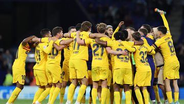 Barcelona's players celebrate winning their 27th Spanish league championship after the Spanish league football match between RCD Espanyol and FC Barcelona at�the RCDE Stadium in Cornella de Llobregat on May 14, 2023. Barcelona won Spain's La Liga for the first time since 2019 by thrashing Espanyol 4-2 today, wrestling the title from rivals Real Madrid. The Catalan giants clinched their 27th Spanish championship with an emphatic derby victory, with Robert Lewandowski scoring twice, alongside Alejandro Balde and Jules Kounde's goals. (Photo by Lluis GENE / AFP)
