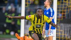 Dortmund's German forward Youssoufa Moukoko celebrates scoring the opening goal during the German first division Bundesliga football match between BVB Borussia Dortmund and FC Schalke 04 in Dortmund, western Germany, on September 17, 2022. - - DFL REGULATIONS PROHIBIT ANY USE OF PHOTOGRAPHS AS IMAGE SEQUENCES AND/OR QUASI-VIDEO (Photo by SASCHA SCHUERMANN / AFP) / DFL REGULATIONS PROHIBIT ANY USE OF PHOTOGRAPHS AS IMAGE SEQUENCES AND/OR QUASI-VIDEO (Photo by SASCHA SCHUERMANN/AFP via Getty Images)