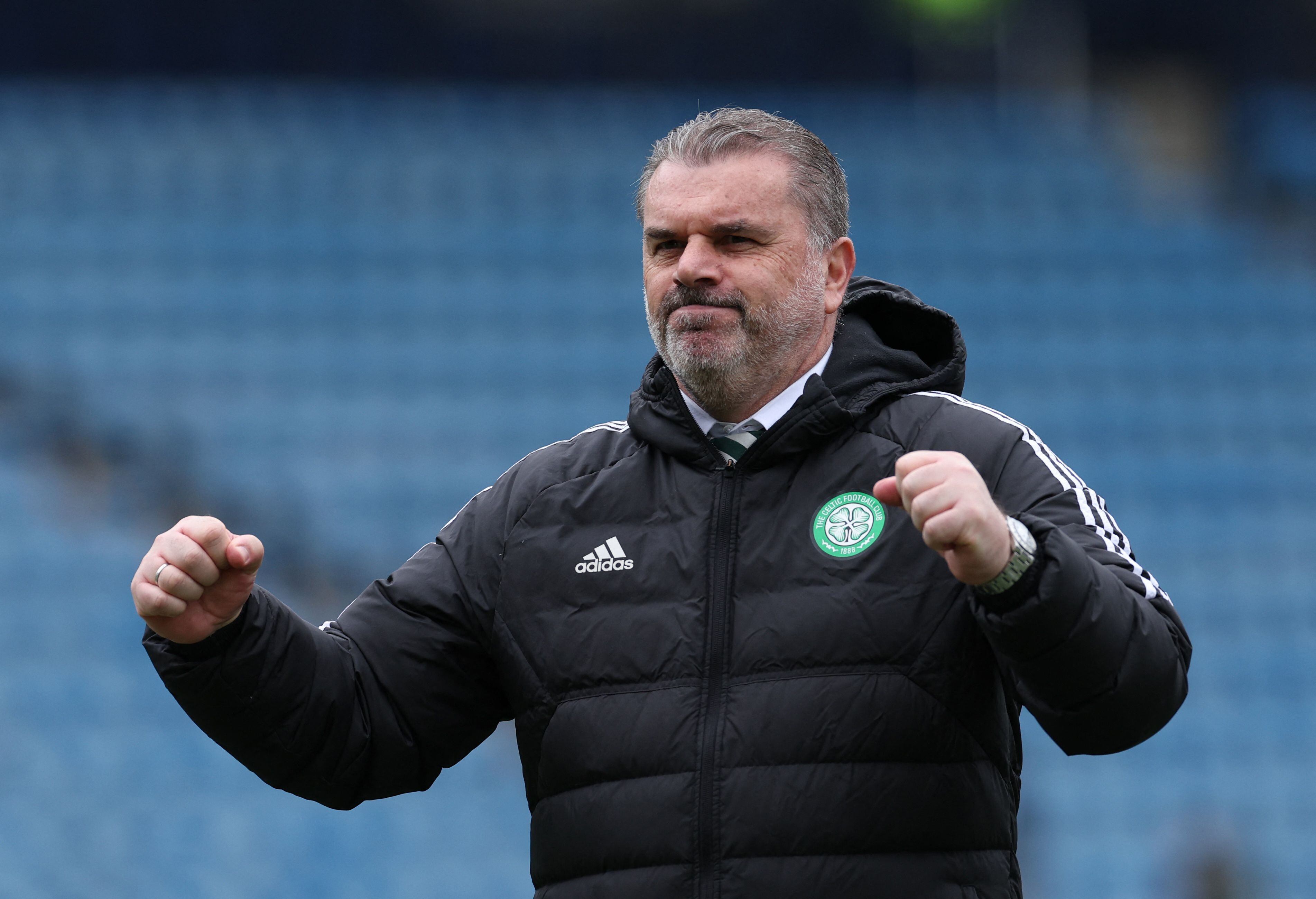 Soccer Football - Scottish Premiership - Kilmarnock v Celtic - Rugby Park, Kilmarnock, Scotland, Britain - April 16, 2023 Celtic manager Ange Postecoglou celebrates after the match REUTERS/Russell Cheyne