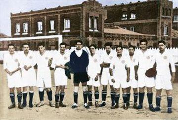 Real Madrid in 1917. All white with black socks.