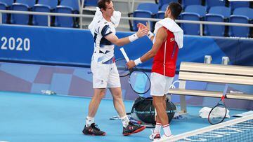 Andy Murray of Team Great shakes hands with Novak Djokovic of Team Serbia after a practice match ahead of the Tokyo 2020 Olympic Games at Ariake Tennis Park on July 22.