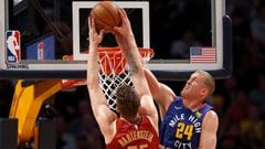 DENVER, COLORADO - FEBRUARY 01: Mason Plumlee #24 of the Denver Nuggets rejects Isaiah Hartenstein #55 of the Houston Rockets in the fourth quarter at the Pepsi Center on February 01, 2019 in Denver, Colorado. NOTE TO USER: User expressly acknowledges and