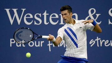 NEW YORK, NEW YORK - AUGUST 23: Novak Djokovic of Serbia returns a shot to Ricardas Berankis of Lithuania during the Western &amp; Southern Open at the USTA Billie Jean King National Tennis Center on August 24, 2020 in the Queens borough of New York City.