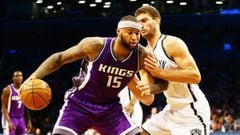 Nov 27, 2016; Brooklyn, NY, USA; Sacramento Kings center center DeMarcus Cousins (15) dribbles the ball as Brooklyn Nets center Brook Lopez (11) defends during the first half at Barclays Center. Mandatory Credit: Andy Marlin-USA TODAY Sports