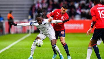 Alberth ELIS of Bordeaux and Zeki CELIK of Lille during the French Ligue 1 Uber Eats soccer match between Lille and Bordeaux on April 2, 2022 in Lille, France. (Photo by Baptiste Fernandez/Icon Sport via Getty Images)