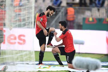 Egypt's Trezeguet and Salah perform the old 'shoe shine celebration' routine.