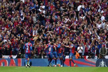 Jason Puncheon is mobbed my team mates after scoring a stunning opener.