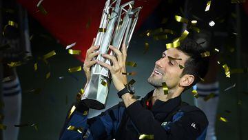 Novak Djokovic holds the trophy after winning the Shanghai Masters. 
