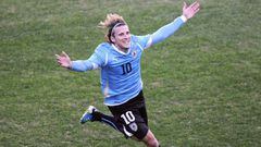 (FILES) In this file picture taken on July 24, 2011 Uruguayan forward Diego Forlan celebrates after scoring against Paraguay during the final of the 2011 Copa America football tournament, at the Monumental stadium in Buenos Aires. - Forlan announced on August 6, 2019 he is retiring from professional football, according to reports in local media. (Photo by Ronaldo SCHEMIDT / AFP)