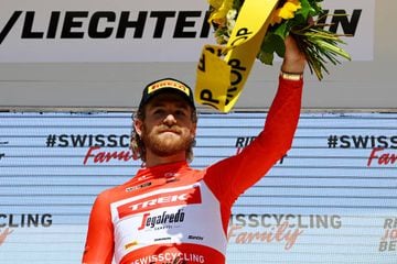 VADUZ, LIECHTENSTEIN - JUNE 19: Quinn Simmons of United States and Team Trek - Segafredo celebrates winning the red mountain jersey on the podium ceremony after the 85th Tour de Suisse 2022 - Stage 8 a 25,6km individual time trial stage from Vaduz to Vaduz / #tourdesuisse2022 / #WorldTour / ITT / on June 19, 2022 in Vaduz, Liechtenstein. (Photo by Tim de Waele/Getty Images)