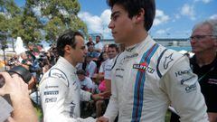 Formula One - F1 - Australian Grand Prix - Melbourne, Australia - 23/03/2017 Williams drivers Felipe Massa (L) of Brazil and Lance Stroll of Canada pass each other during the driver portrait session at the first race of the year.     REUTERS/Jason Reed