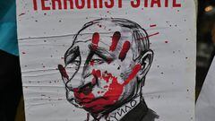 A protester holds a placard with a caricature of Vladimir Putin and words 'Terrorist State'.
Ukrainians people living in Krakow and their supporters are seen during the '200 days of Terror' protest in Krakow's Main Square, on the 200th day of the Russian invasion of Ukraine.
On Sunday, September 11, 2022, in Krakow, Lesser Poland Voivodeship, Poland. (Photo by Artur Widak/NurPhoto via Getty Images)
