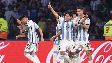 Picture released by Telam showing Argentina's forward Luka Romero (C) celebrating with his teammates after scoring against Guatemala during the Argentina 2023 U-20 World Cup Group A football match between Argentina and Guatemala at the Madre de Ciudades stadium in Santiago del Estero, Argentina, on May 23, 2023. (Photo by ALFREDO LUNA / TELAM / AFP) / Argentina OUT / RESTRICTED TO EDITORIAL USE - MANDATORY CREDIT "AFP PHOTO / TELAM - Alfredo Luna" - NO MARKETING - NO ADVERTISING CAMPAIGNS