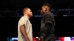 (FILES) Canelo Alvarez of Mexico (L) and Jermell Charlo (R) face off during a press conference to preview their September 30 super middleweight undisputed championship fight at Palladium Times Square on August 15, 2023 in New York. Alvarez is out to prove he remains the king of middleweight boxing when he puts his titles on the line against Charlo on Saturday in a clash of undisputed world champions in Las Vegas. The veteran Mexican superstar heads into Saturday's battle at the T-Mobile Arena with some in boxing wondering whether he is a fading force, after a sequence of recent performances that have fallen short of his normally dazzling standards. (Photo by Sarah Stier / GETTY IMAGES NORTH AMERICA / AFP)