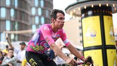 EF Education-Easypost team's Colombian rider Rigoberto Uran cycles to attend the cycling teams' presentation two days ahead of the first stage of the 109th edition of the Tour de France cycling race, in Copenhagen, in Denmark, on June 29, 2022. (Photo by Marco BERTORELLO / AFP)