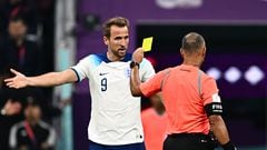 ngland's forward #09 Harry Kane argues with Brazilian referee Wilton Sampaio as he shows a yellow card to France's forward #07 Antoine Griezmann (unseen) during the Qatar 2022 World Cup quarter-final football match between England and France at the Al-Bayt Stadium in Al Khor, north of Doha, on December 10, 2022. (Photo by GABRIEL BOUYS / AFP)