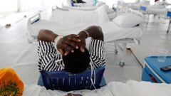 A COVID-19 patient reacts after being tested inside a field hospital built&Ecirc;on a soccer stadium in Machakos, as the number of confirmed coronavirus disease (COVID-19) cases continues to rise in Kenya, July 23, 2020. Picture taken July 23, 2020.REUTER