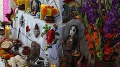 WASHINGTON, DC - NOVEMBER 01:  A Día de los Muertos ofrenda display to honor and celebrate the lives of loved ones who have passed is seen at the West Garden Room of the White House on November 1, 2022 in Washington, DC. The White House partnered with the National Museum of Mexican Art in Chicago, a collaboration initiated by first lady Jill Biden, for the ofrenda display to showcase photos of White House staff’s loved ones who have passed to celebrate their lives and memories.  (Photo by Alex Wong/Getty Images)