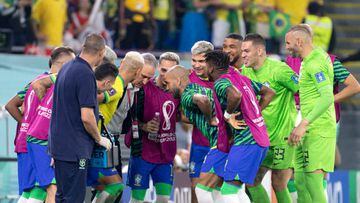 DOHA, QATAR - DECEMBER 05: Richarlison of Brazil celebrates with team mates and Head Coach Tite Bacchi after scoring his goal ,during the FIFA World Cup Qatar 2022 Round of 16 match between Brazil and South Korea at Stadium 974 on December 5, 2022 in Doha, Qatar. (Photo by MB Media/Getty Images)