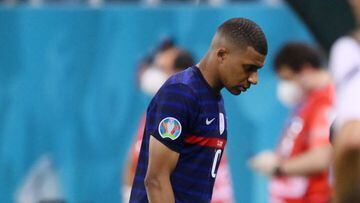 Soccer Football - Euro 2020 - Round of 16 - France v Switzerland - National Arena Bucharest, Bucharest, Romania - June 29, 2021   France&#039;s Kylian Mbappe looks dejected as he leaves the pitch after having his penalty saved in the shoot-out Pool via RE