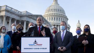 Republican Representative from New York Tom Reed (C) and Democratic Representative from New Jersey Josh Gottheimer (2-R), co-chairs of the bipartisan &#039;Problem Solvers Caucus&#039;; participate in a news conference with fellow members of the caucus to