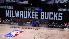 Aug 26, 2020; Lake Buena Vista, Florida, USA; Referees stand on an empty court before the start of a scheduled game between the Milwaukee Bucks and the Orlando Magic for Game Five of the Eastern Conference First Round during the 2020 NBA Playoffs at AdventHealth Arena at ESPN Wide World Of Sports Complex on August 26, 2020 in Lake Buena Vista, Florida. Mandatory Credit: Kevin C. Cox/Pool Photo-USA TODAY Sports