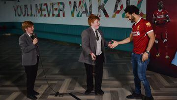 Mohamed Salah of Liverpool surprising school children for a 'Kop Kids' episode at Anfield, Liverpool, England.